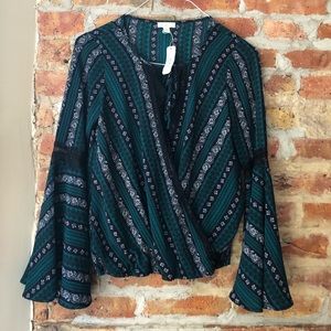 Flowy lacey blouse with bell sleeves. Size small.